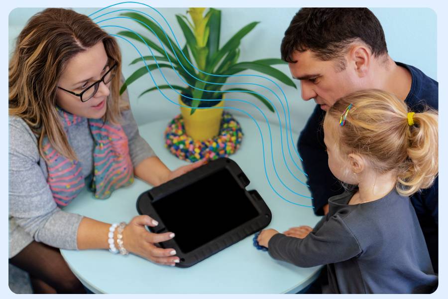 Adults and child using a tablet